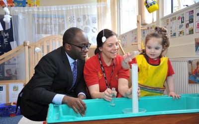 Education Minister Sam Gyimah with Sam Martin, neighbourhood development worker, and Imogen Sickling in the Tiny Steps provision for two-year-olds